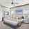 a bedroom with a bed and a television