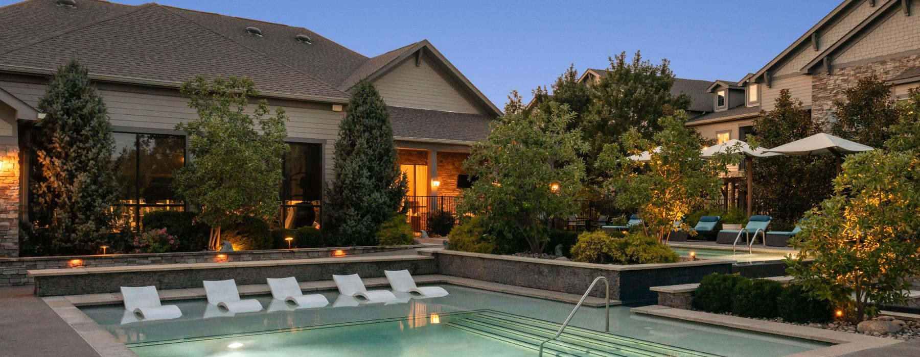 a swimming pool at dusk