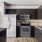 a kitchen with black cabinets
