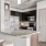 a kitchen with a marble island